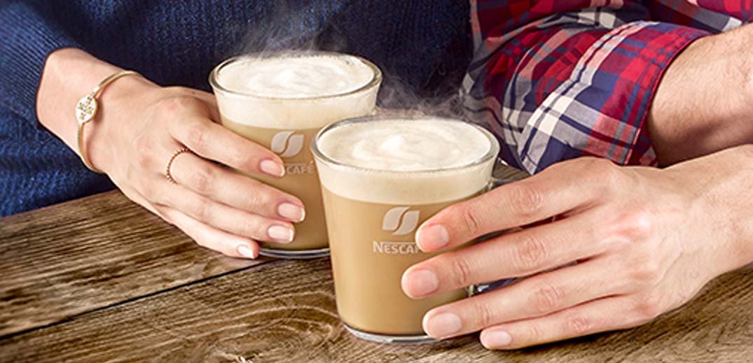 nescafe-couple-drinking-wide couple drinking a cup of coffee